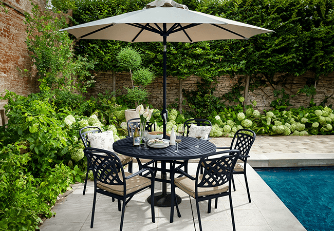 Image of Hartman Berkeley 6 Seat Round Dining Set in Bronze / Amber
