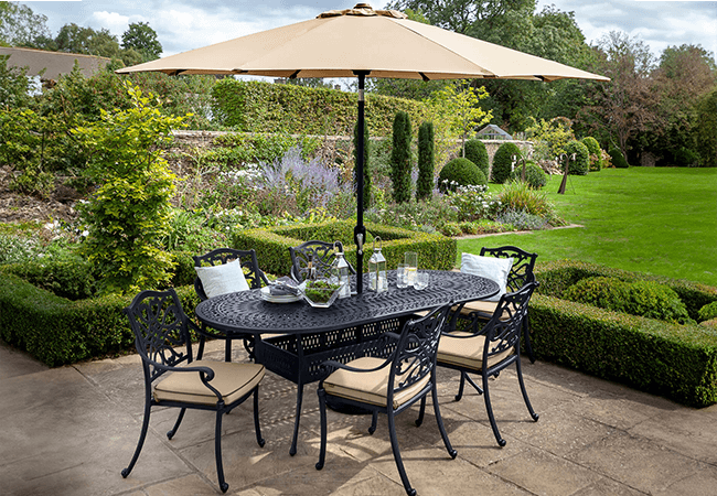 Image of Hartman Capri 6 Seat Oval Dining Set in Bronze & Amber