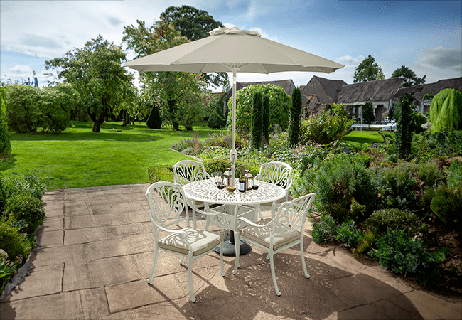 Image of Hartman Amalfi Round 4 Seat Dining Set in Maize / Wheatgrass
