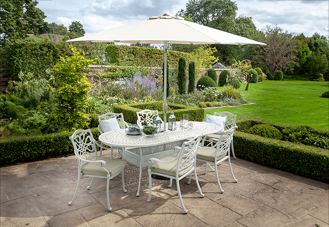 Image of Hartman Capri 6 Seat Oval Dining Set in Maize / Wheatgrass