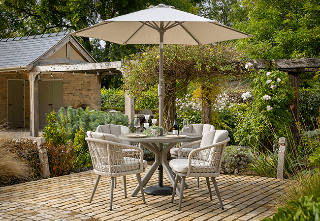 Image of Hartman Aries 4 Seat Round Dining Set