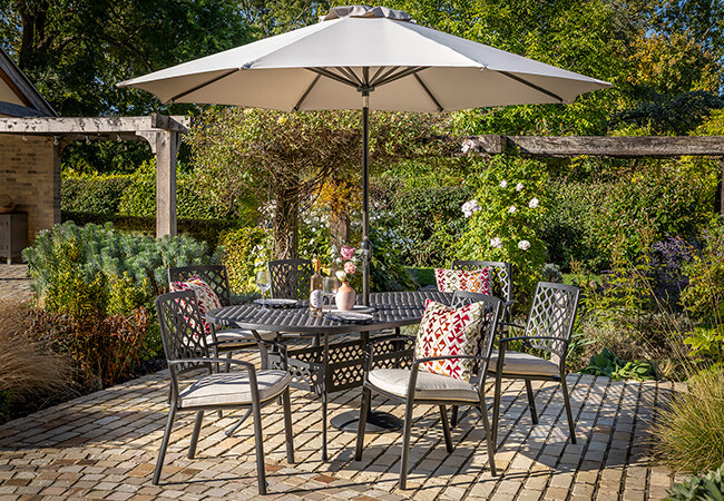 Image of Hartman Avebury 6 Seat Oval Dining Set in Bronze / Oatmeal