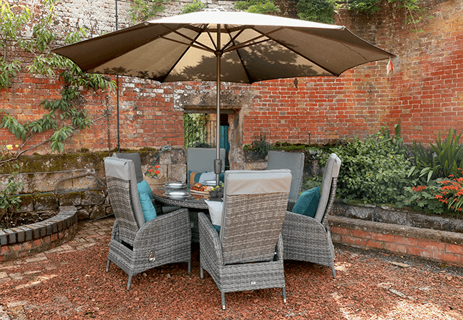 Image of Supremo Tivoli Reclining 6 Seat Round Dining Set in Lead Grey