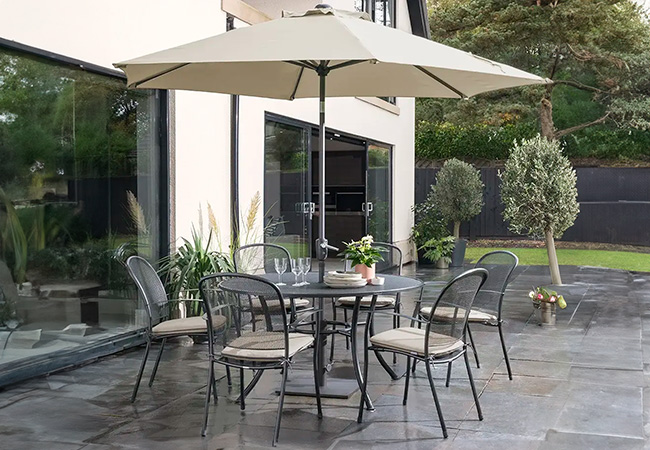 Image of Kettler Caredo 6 Seater Round Dining Set with Parasol in Stone