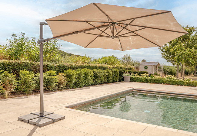 Image of Kettler Orion 3.0m Round LED Cantilever Parasol with Side Tilt, Granite Base & Night Cover - Grey Frame / Stone Canopy