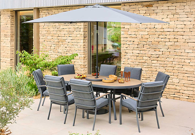 Image of LG Monza 8 Seat Oval Set with Lazy Susan, Highback Armchairs and 2.0m x 3.0m Parasol