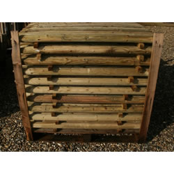 Image of Pack of 10 1.2m (4ft) tall, 50mm diameter treated Round Wooden Fence Posts