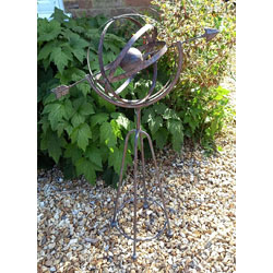 Image of Decorative Metal Armillary Sphere Globe Garden Sculpture in a Rustic Bronze Finish