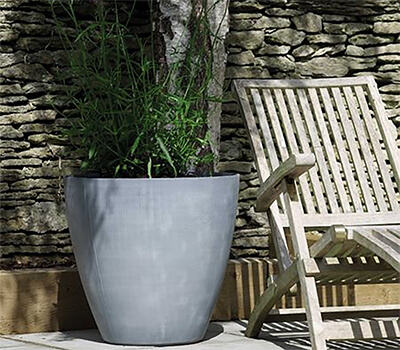 Image of Stewart 53cm Tall Round Beton Planter in Dark Grey